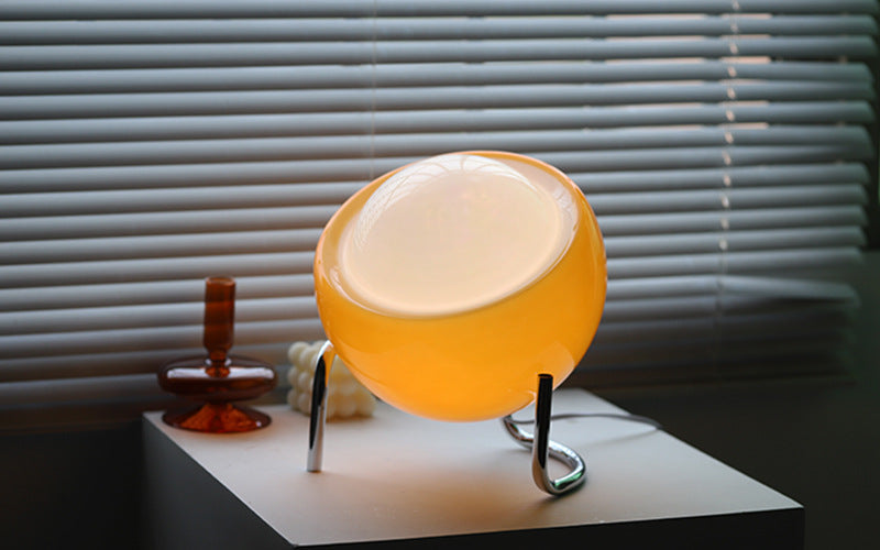 Retro glass orb lamp, a charming Nordic home accent light. Modern classic LED table lamp for ambient decor.