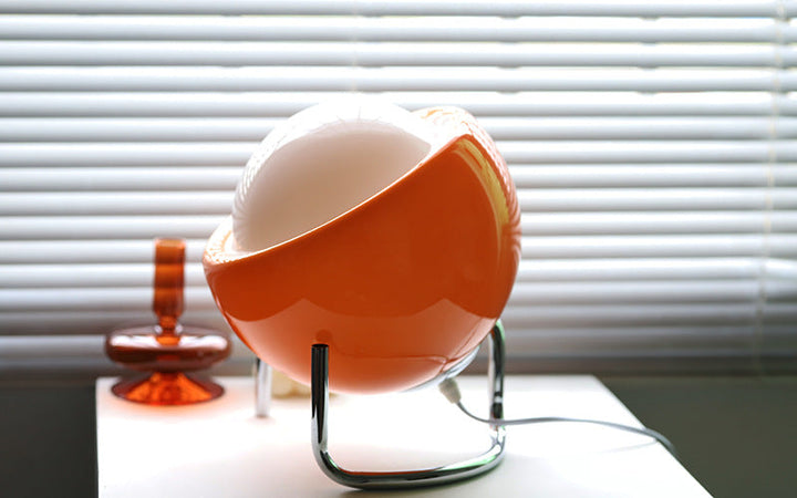 Modern LED table lamp, a retro glass orb accent light. Nordic ambient lamp for stylish bedroom and living room decor.