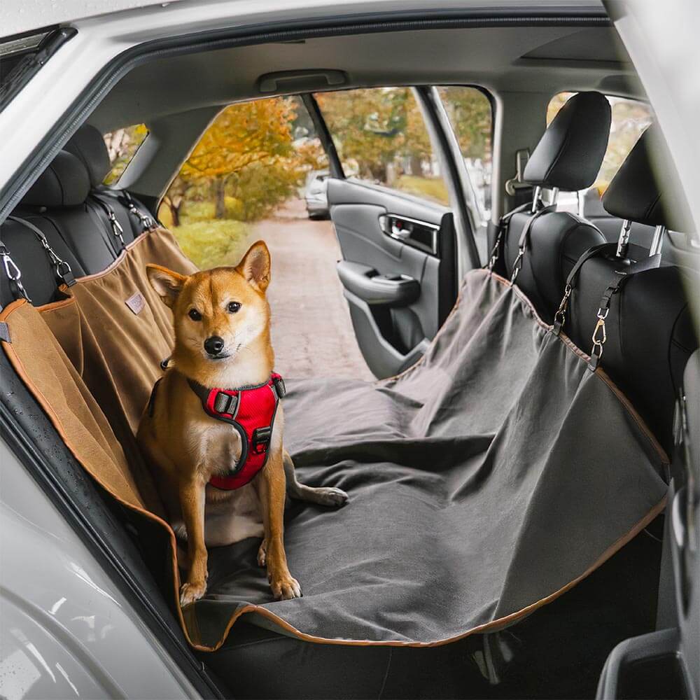 Dog car seat cover, waterproof, for vehicle protection during outdoor adventures or camping.