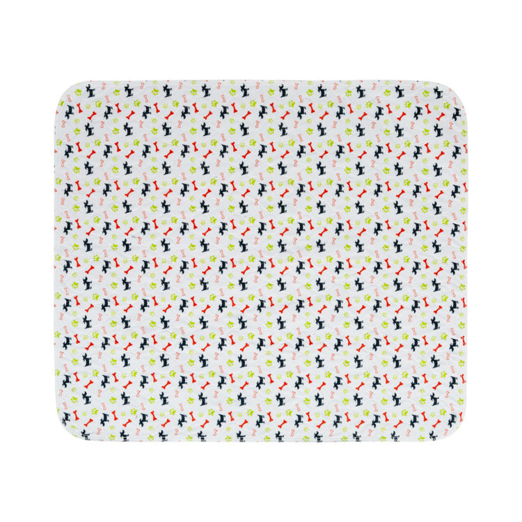 Close-up of a reusable dog training pad showing soft, absorbent fabric and stitched edges.