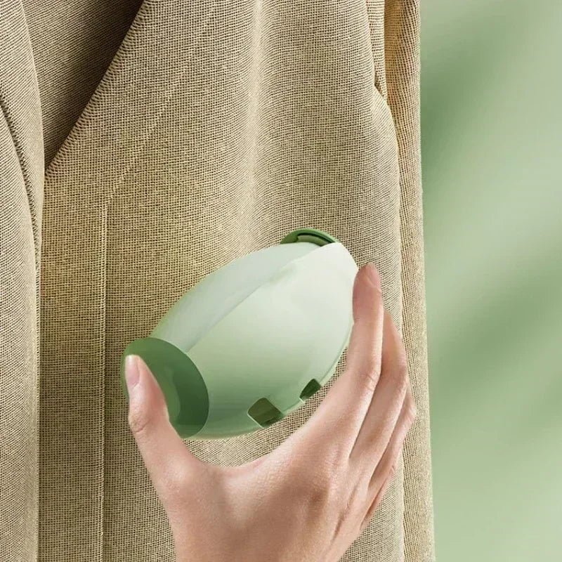 Eco-friendly gel adhesive lint roller cleaning dust off a sofa cushion.