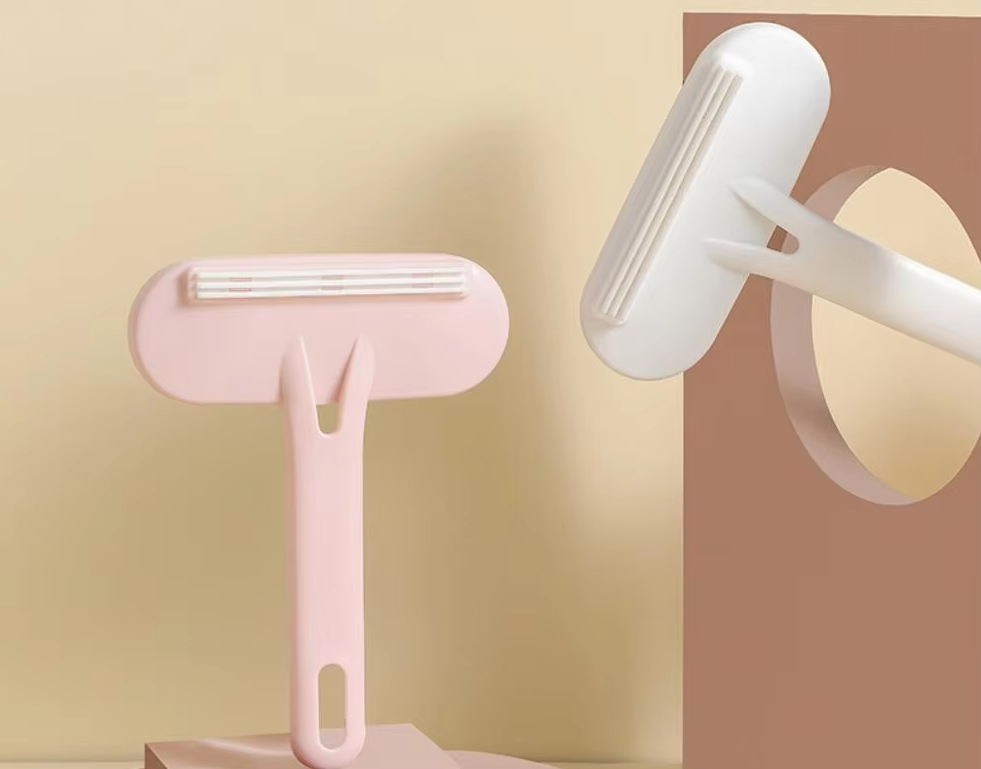 Portable pet hair lint remover for clothing and upholstery, washable and reusable silicone roller.