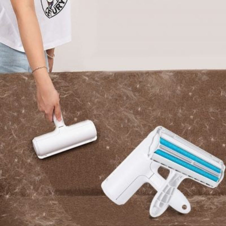 Hand holding a reusable pet fur remover roller on a sofa, demonstrating home care pet accessories