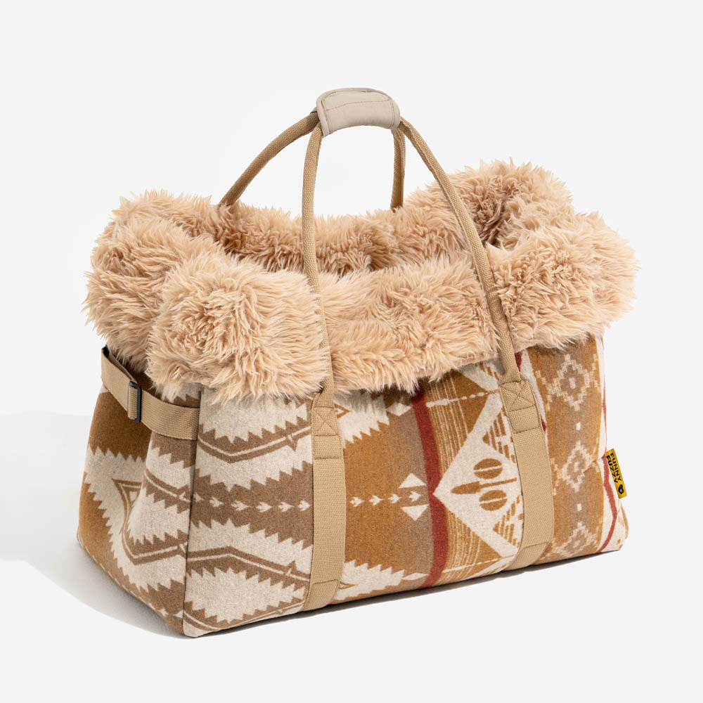 Multi-functional pet accessory: reversible carrier and all-season dog snuggle bed with a unique indie boho style.