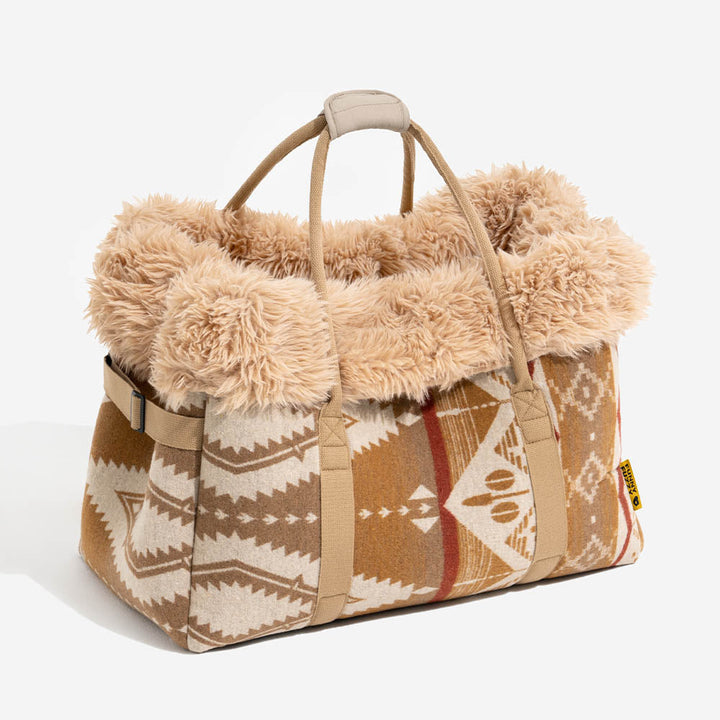 Multi-functional pet accessory: reversible carrier and all-season dog snuggle bed with a unique indie boho style.