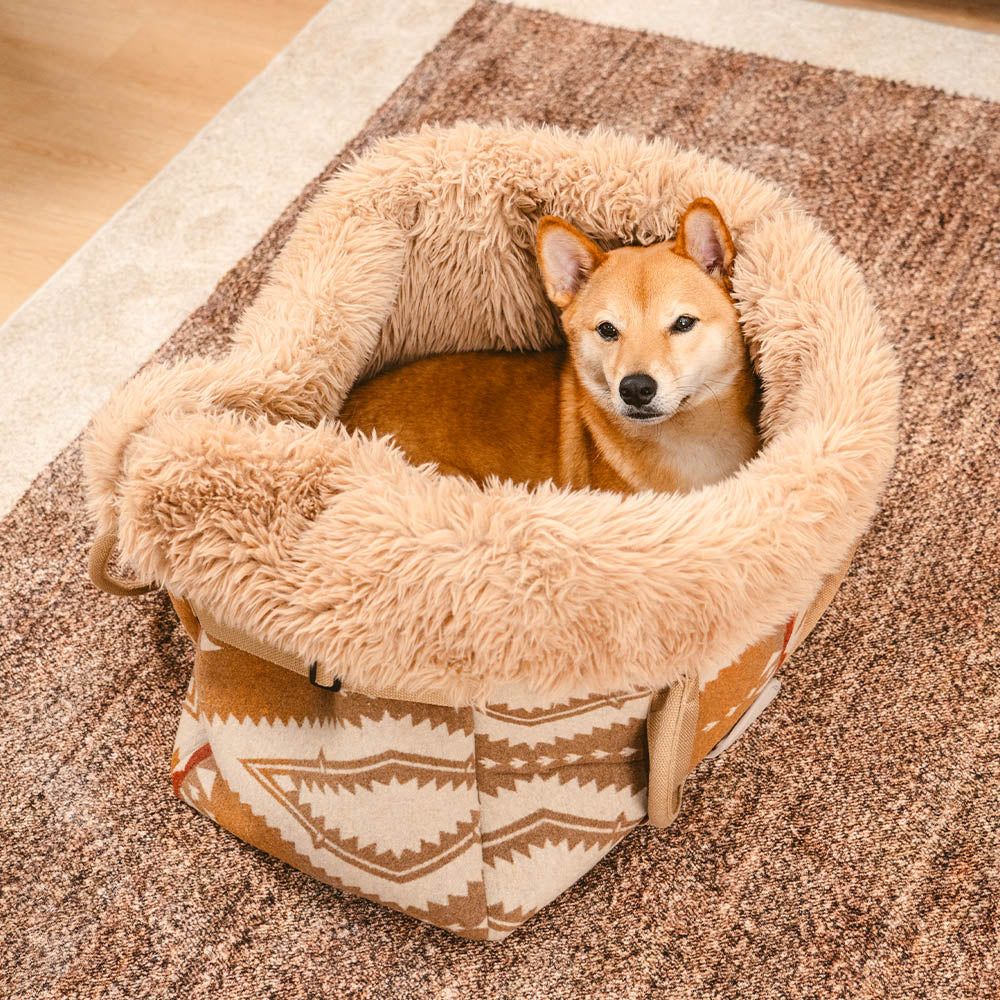 Indie boho reversible pet carrier, doubles as an all-season dog and cat bed, ideal for traveling pets.