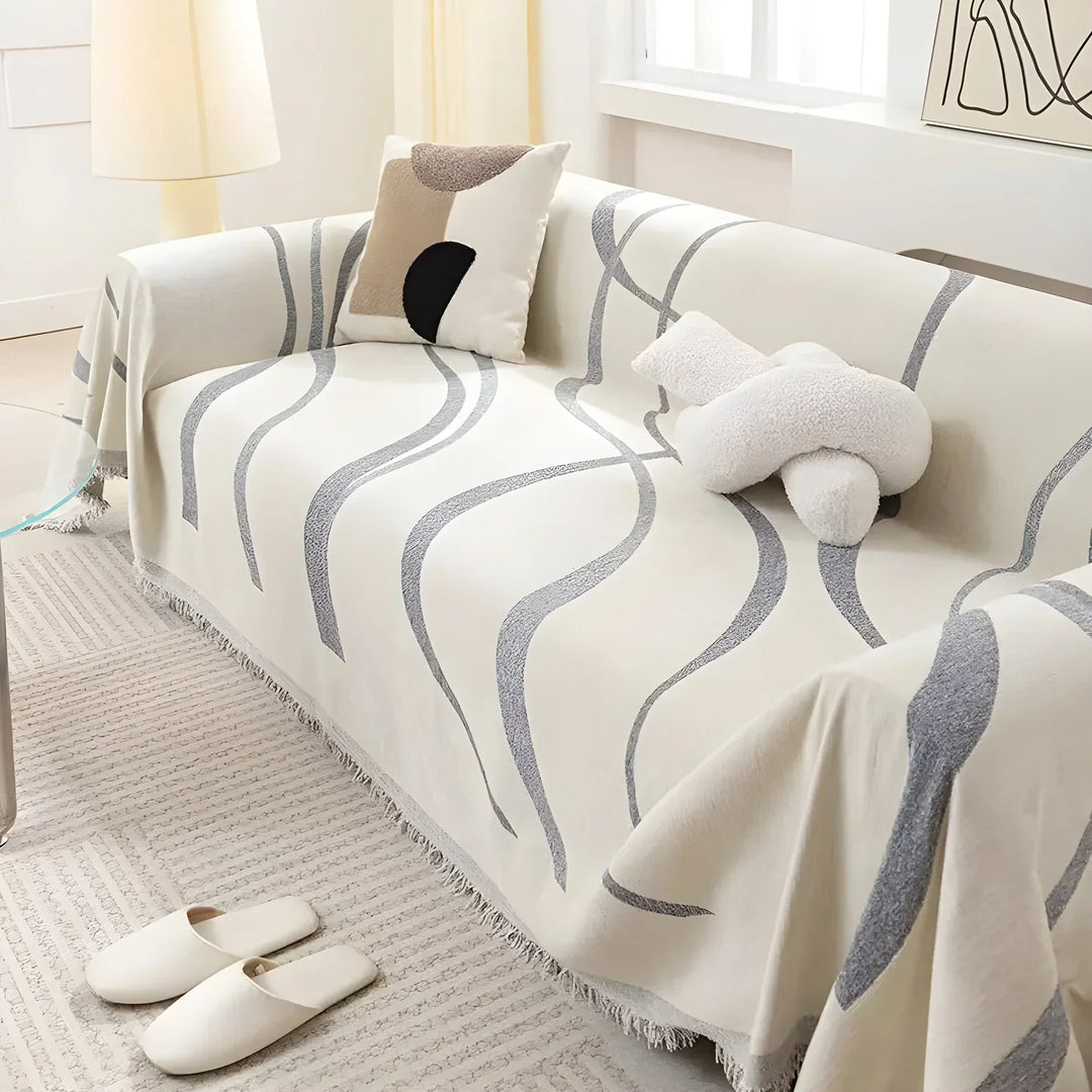 Pet friendly reversible sofa protector in warm khaki and cool gray for versatile home decor