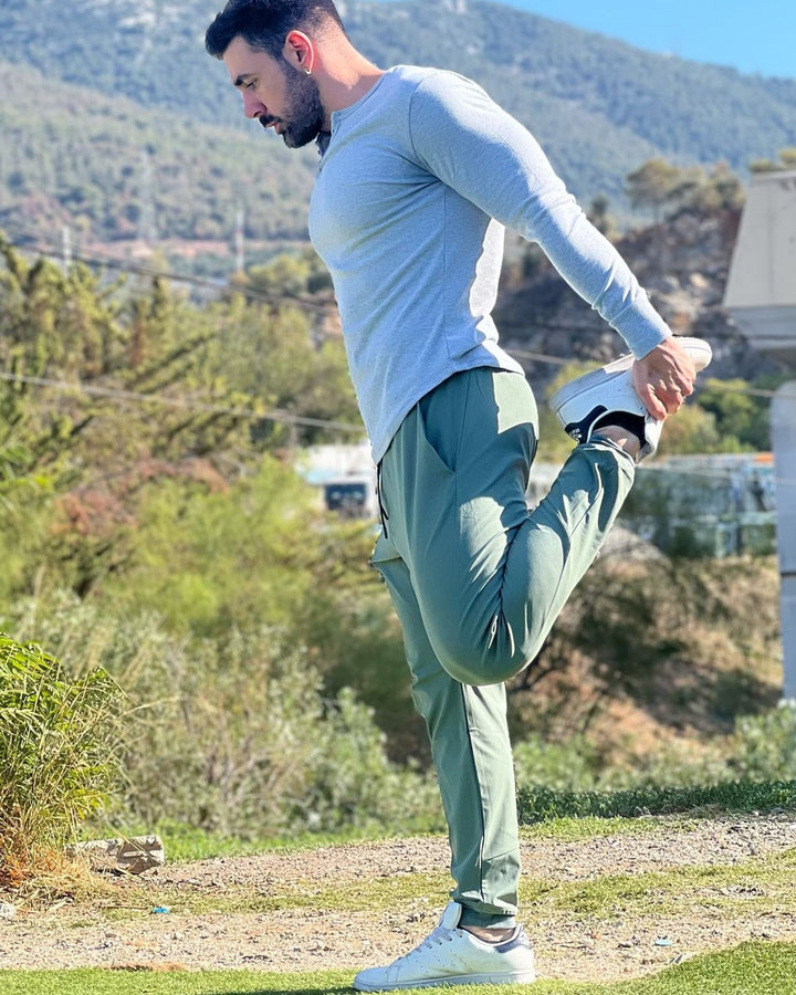 Comfortable men's long sleeve henley in ribbed knit, great for versatile layering.