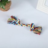 Dental health focused dog chew toy, a robust rope with bright, durable fringes.