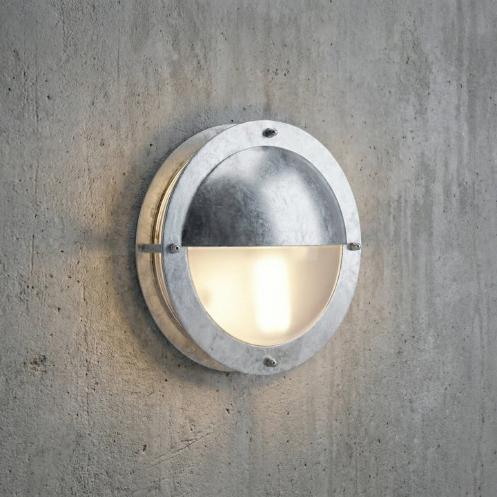 Marinova round galvanized outdoor wall light. Dimmable, weatherproof exterior lighting for porch & garden.