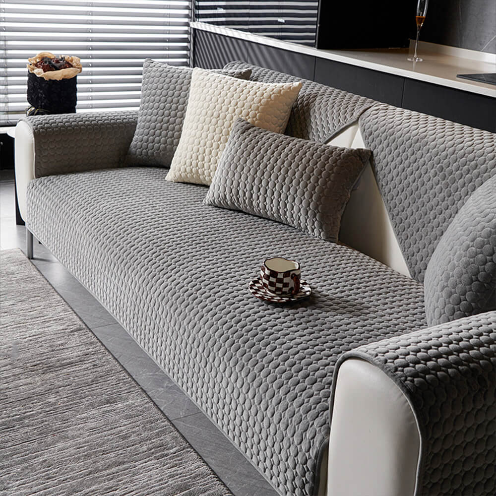 Modern round quilted suede couch cover, adds sophistication, non-slip furniture protection