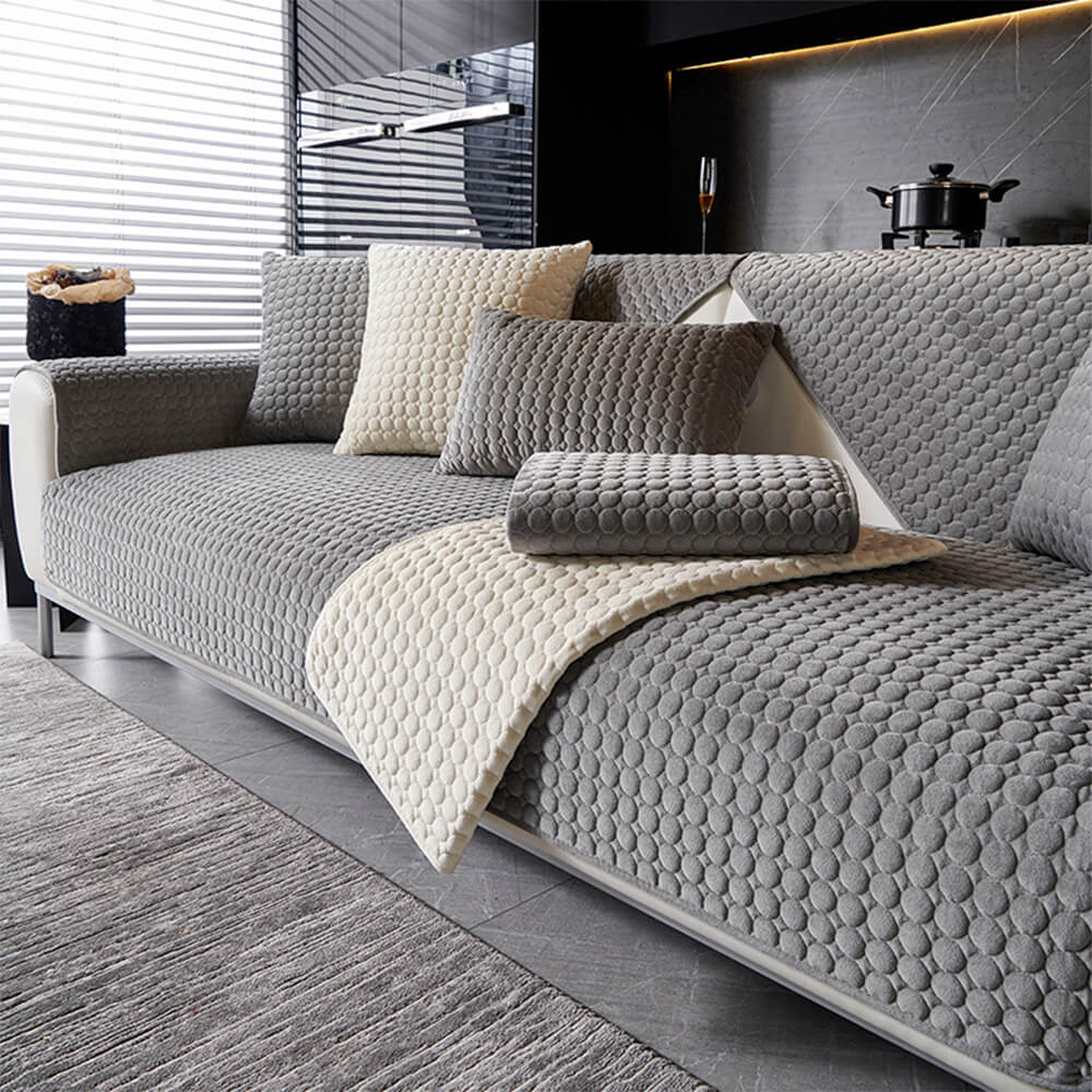 Round quilted suede sofa protector in dark brown, moisture-absorbent, non-slip design