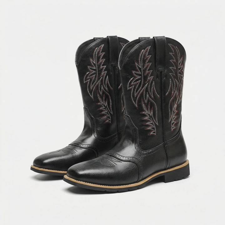 Fashionable men's rugged cowboy boots, calf-length, with detailed embroidery and a comfortable block heel.