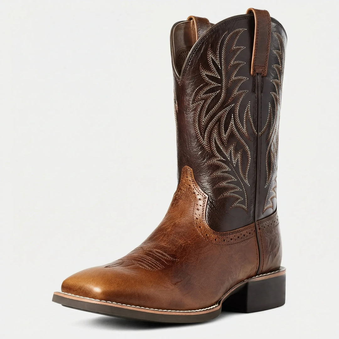 Stylish calf-length men's cowboy boots with a rugged design, block heel, and detailed western embroidery.