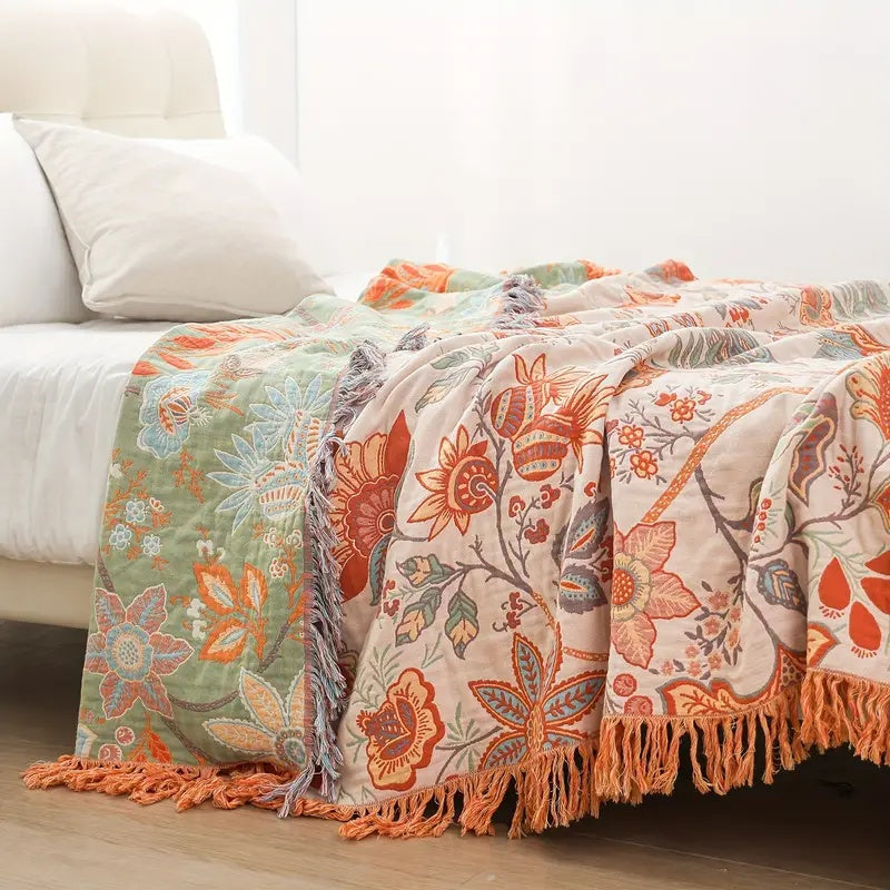 Soft 100% cotton boho throw blanket with a rustic floral pattern, ideal for bohemian home accents.