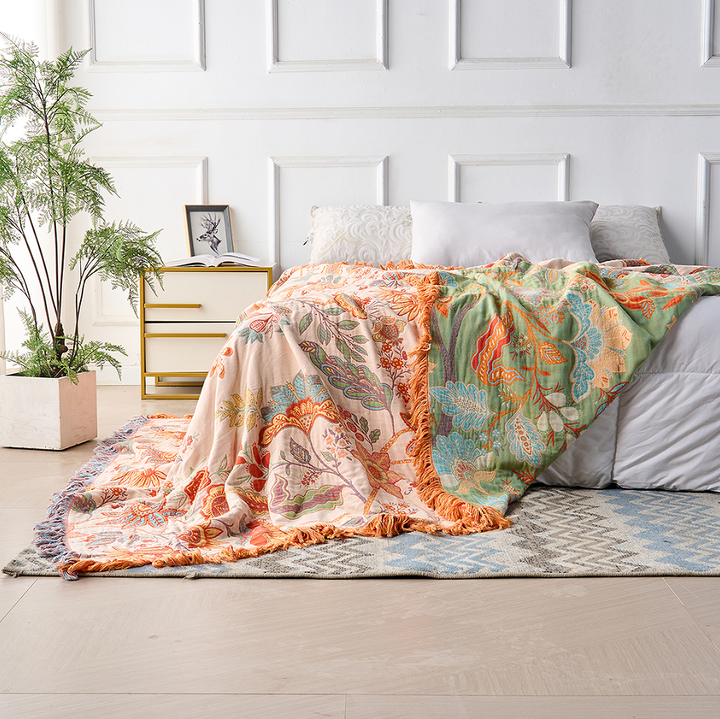 Bohemian style 100% cotton throw blanket featuring a rustic floral design.