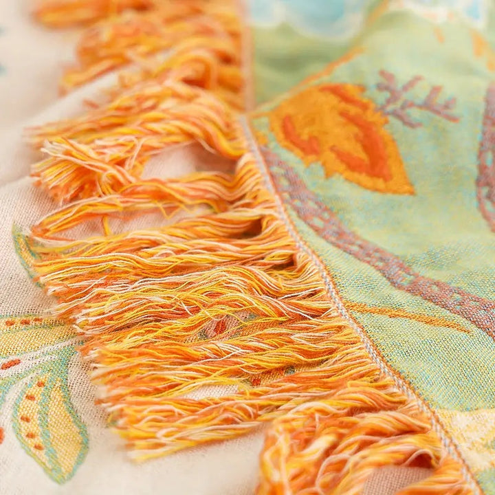 Soft 100% cotton boho throw with an elegant rustic floral pattern, perfect for your home.