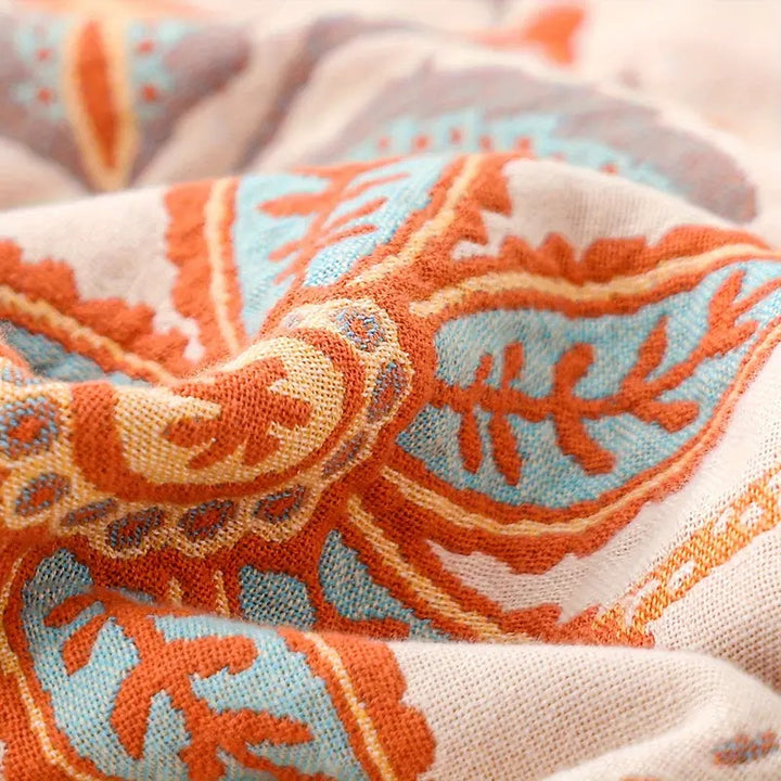 Boho floral cotton throw blanket, a rustic accent for your sofa or bed.
