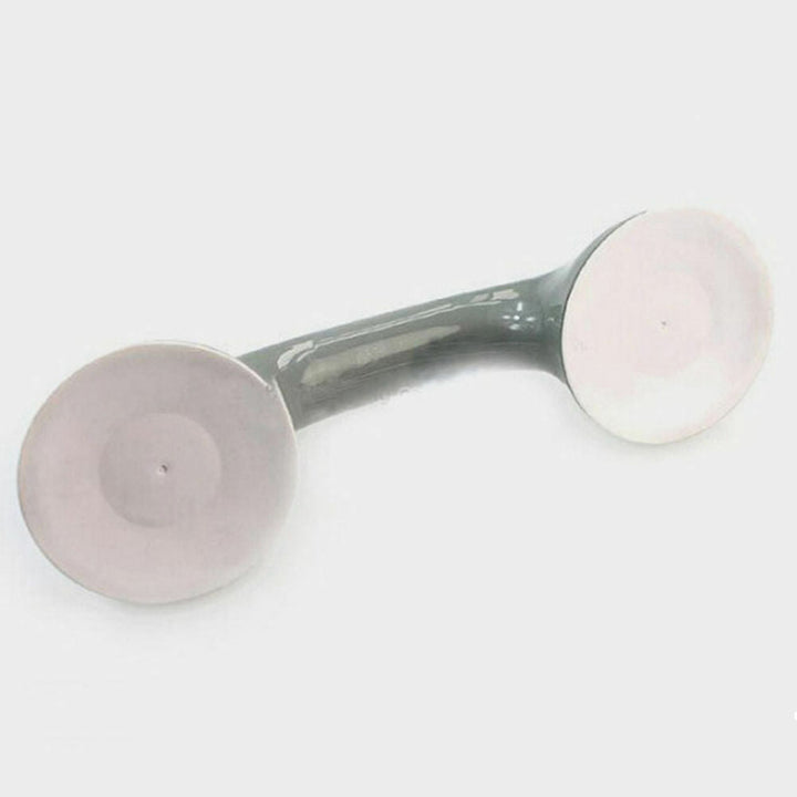 Portable suction cup shower handle for quick bathroom safety. Easy-to-install grab bar for elderly mobility.