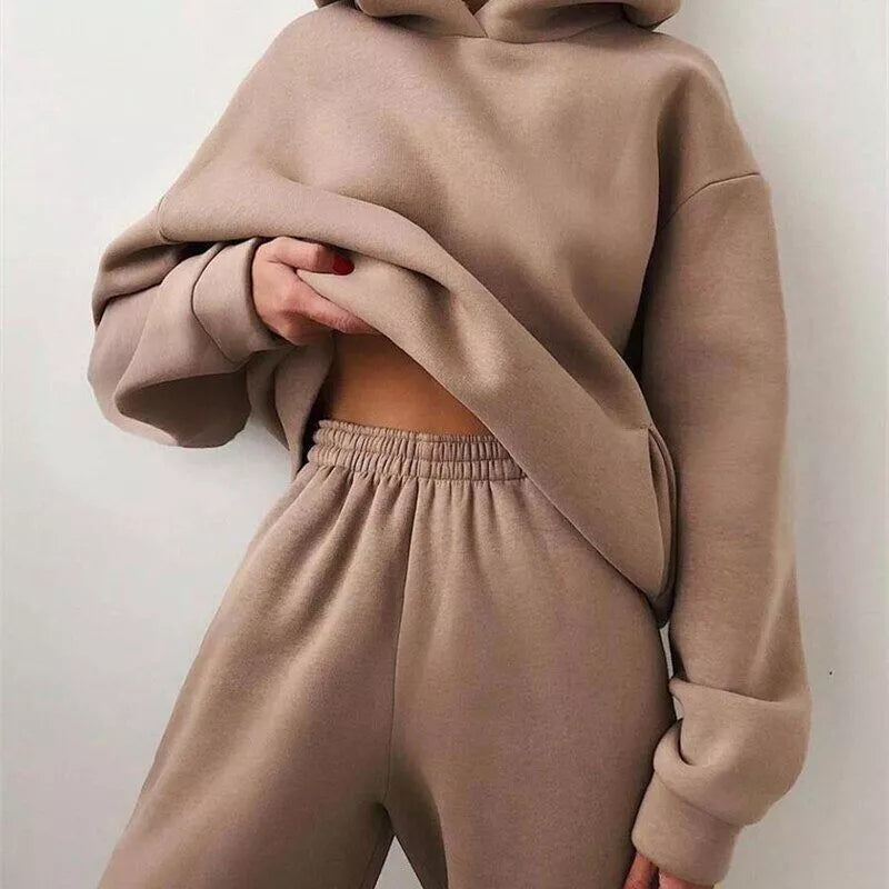 Stylish women's two-piece Serenity set featuring a relaxed-fit hoodie & comfortable joggers for casual wear.