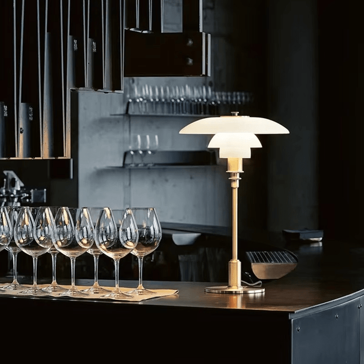 Versatile LED table lamp with dimmable tricolor light, complementing modern or Scandinavian home decor.
