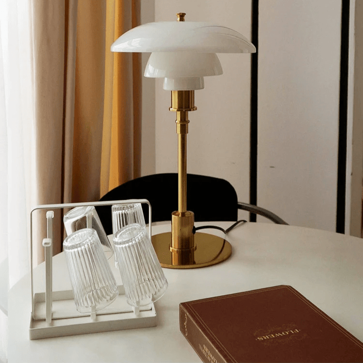 Stylish glass LED table lamp, Scandinavian design, with dimmable tricolor light for modern living spaces.