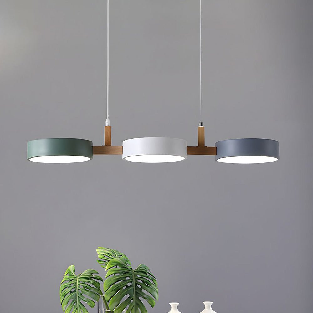 Elegant Scandinavian LED pendant lamp illuminating a modern dining room with a warm, adjustable glow.