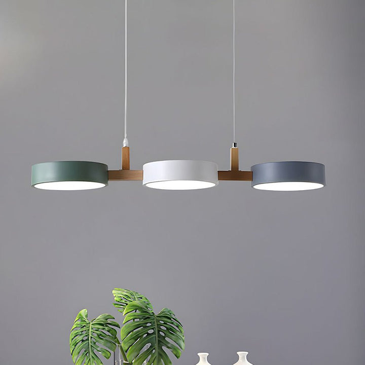 Elegant Scandinavian LED pendant lamp illuminating a modern dining room with a warm, adjustable glow.