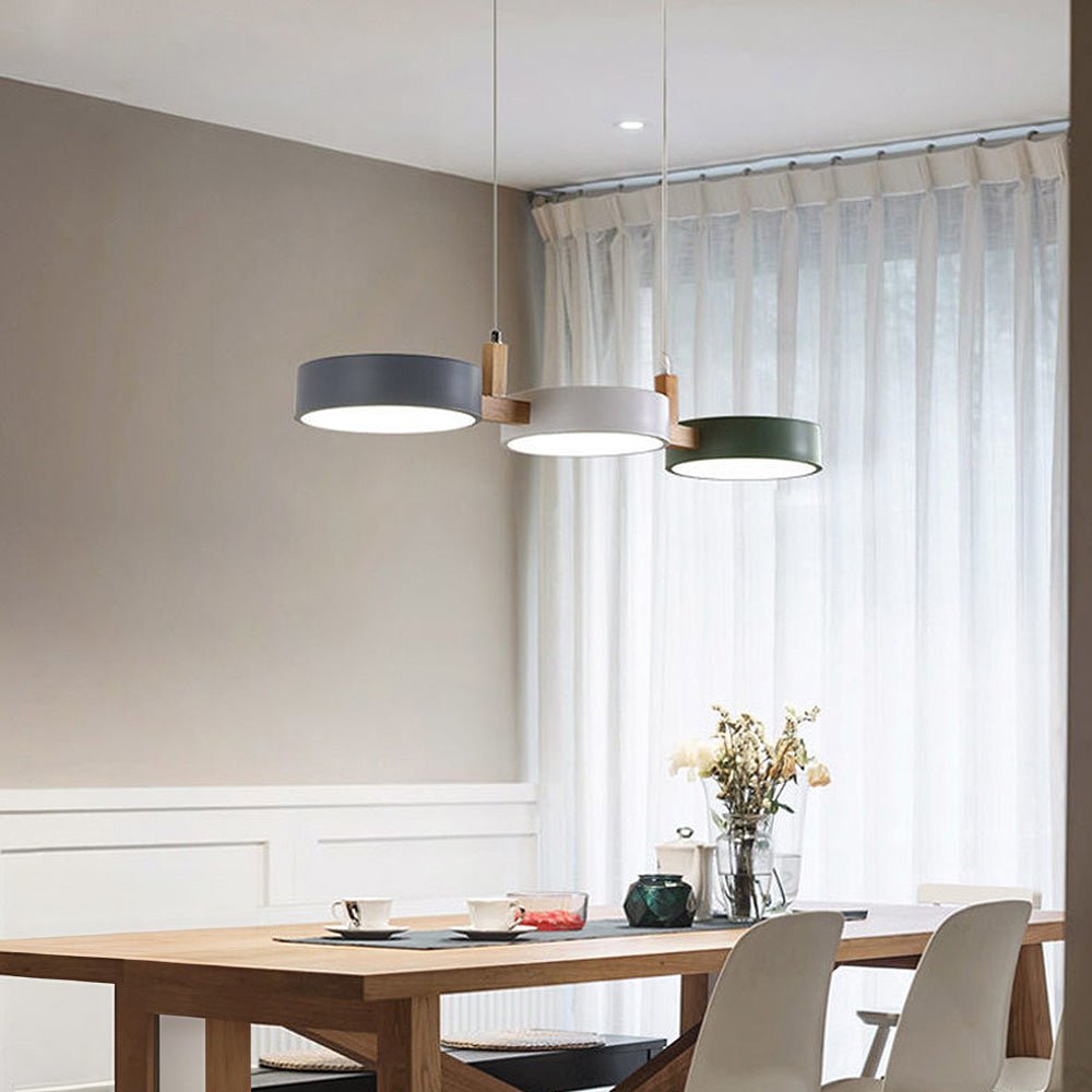 Modern Scandinavian LED pendant lamp, matte finish, providing adjustable warm glow for home decor.