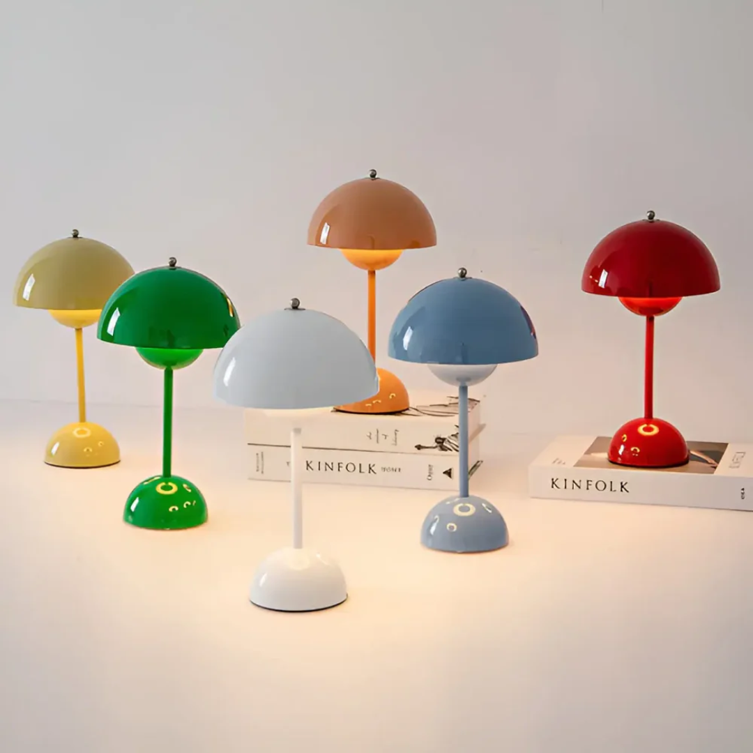 Stainless steel wireless table lamp with adjustable ambiance, a sleek modern accent light.