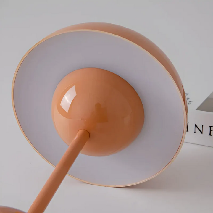 Nordic design table lamp, wireless & portable, ideal accent lighting for living room decor.