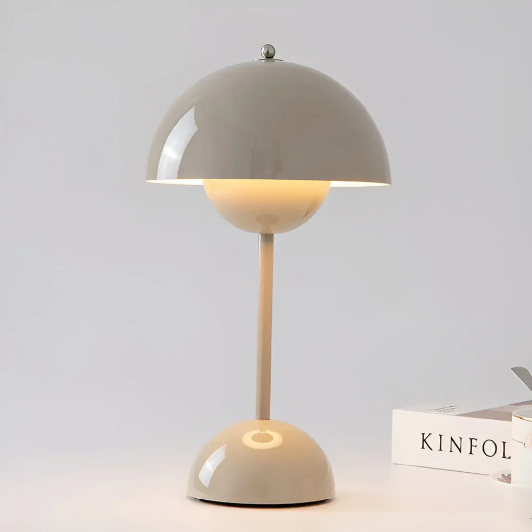 Cordless Scandinavian table lamp, adjustable brightness for flexible lighting in any space.