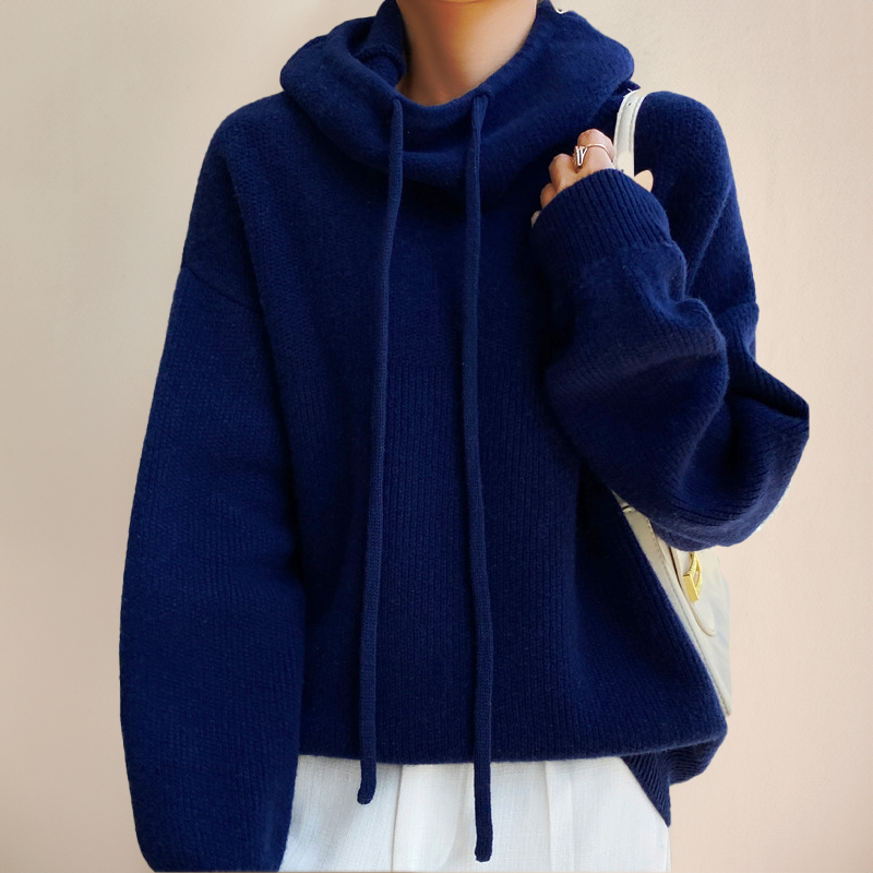 Women's chic turtleneck sweater with elegant long sleeves. A comfortable and versatile top, perfect for new season style.