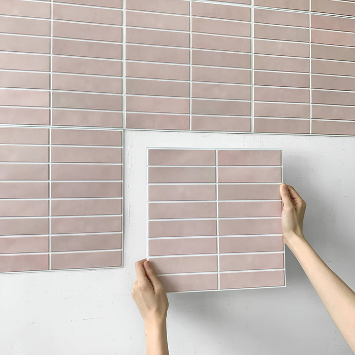 Realistic 3D ceramic look wall panels, self-adhesive for elegant and modern kitchen decor.