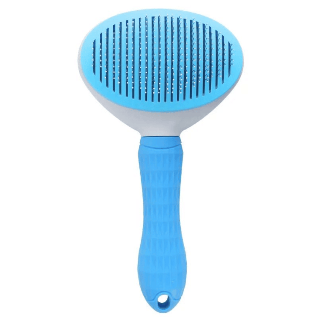Hand holding a self-cleaning dog & cat grooming brush, demonstrating the button for hair release