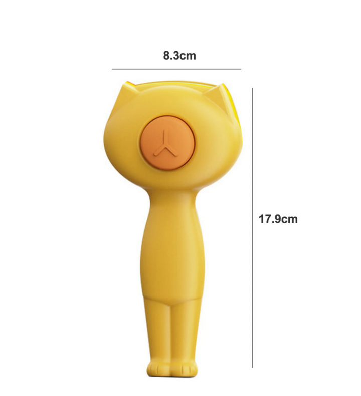 Hand pressing the self-cleaning button on a pet hair removal brush for easy fur disposal