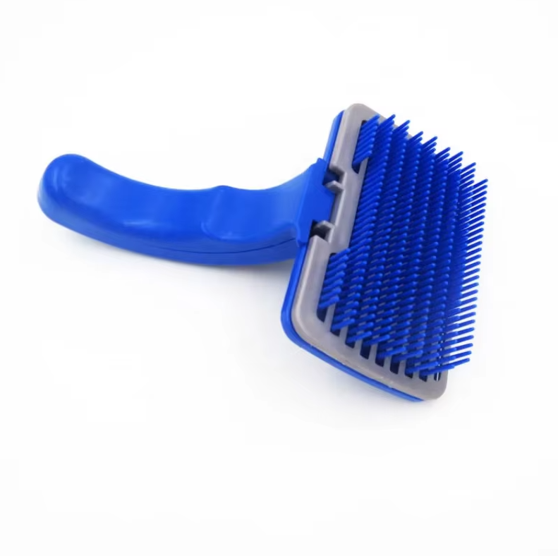 Blue pet care grooming tool with soft silicone bristles, ideal for self-cleaning and effective fur removal