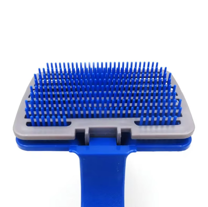 Pet grooming brush designed with durable silicone bristles and a convenient self-cleaning mechanism for cats and dogs