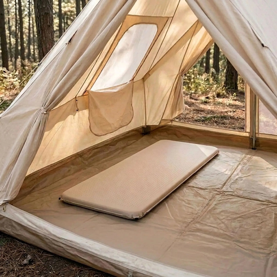 Self-inflating camping sleeping pad for comfortable outdoor and car camping adventures.