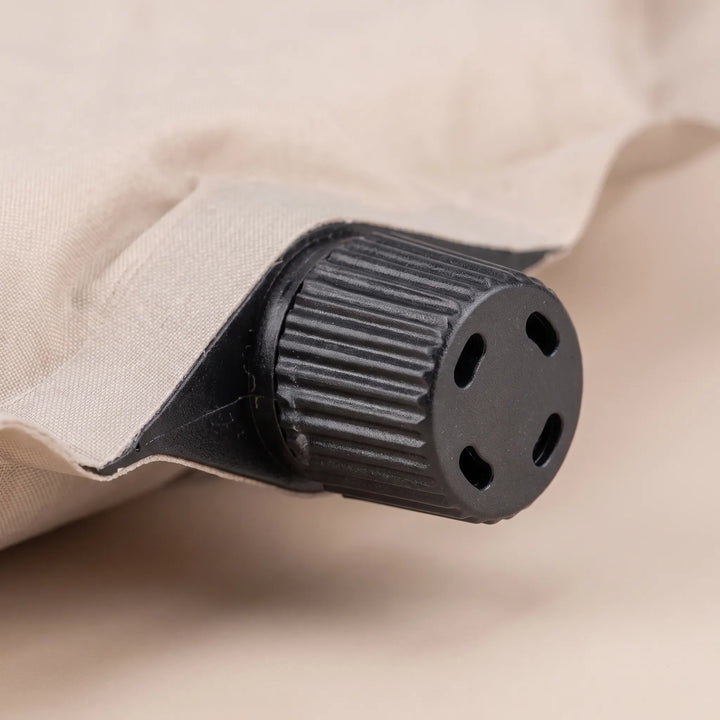 Durable self-inflating foam sleeping pad for camping, hiking, and comfortable outdoor adventures.