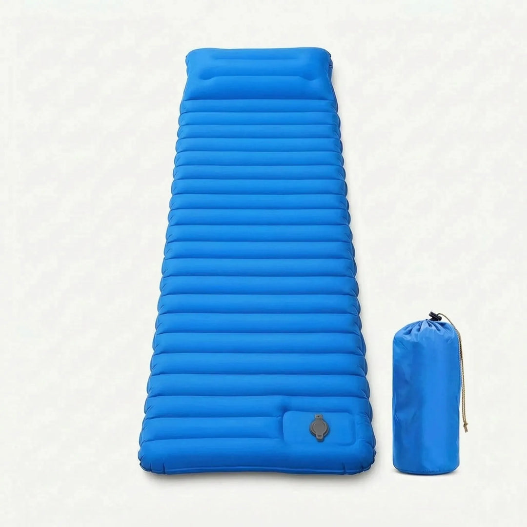 Compact self-inflating sleeping pad rolled up for travel. Lightweight, portable outdoor gear for backpacking.
