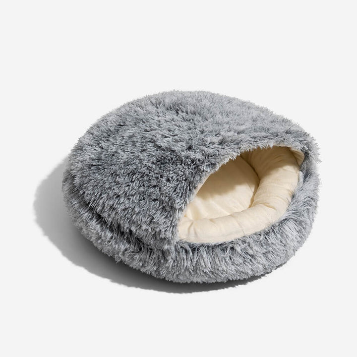 New semi-enclosed pet nest bed, plush fabric, calming design for comfortable sleep.