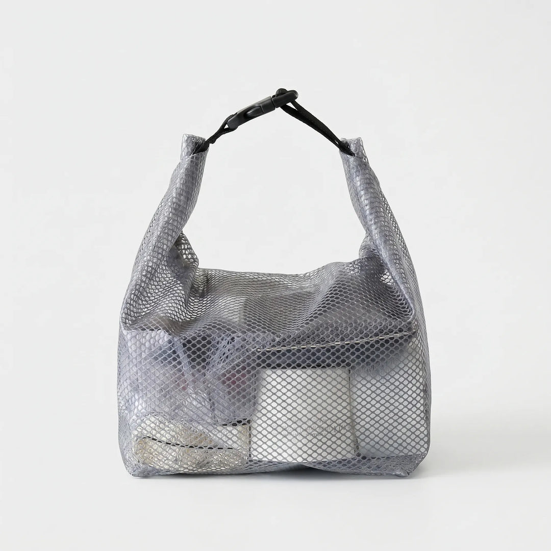 Clear, water-resistant travel toiletry bag, ideal for airport security & visible organization of essentials.
