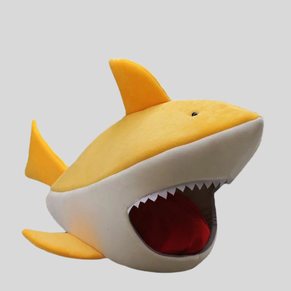 Cozy pet hideaway bed with a playful shark design for cats and small dogs