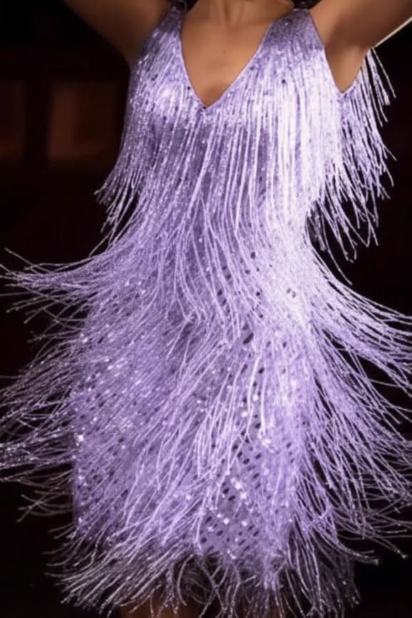 Women's dazzling A-line fringe party dress. This shimmering sequin mini dress is ideal for any special occasion.