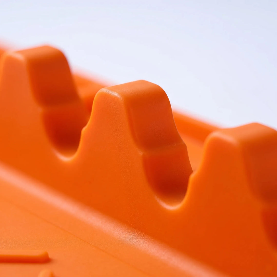 Heat-resistant silicone organizer mat for BBQ tools & cooking utensils. Keeps grill area tidy.