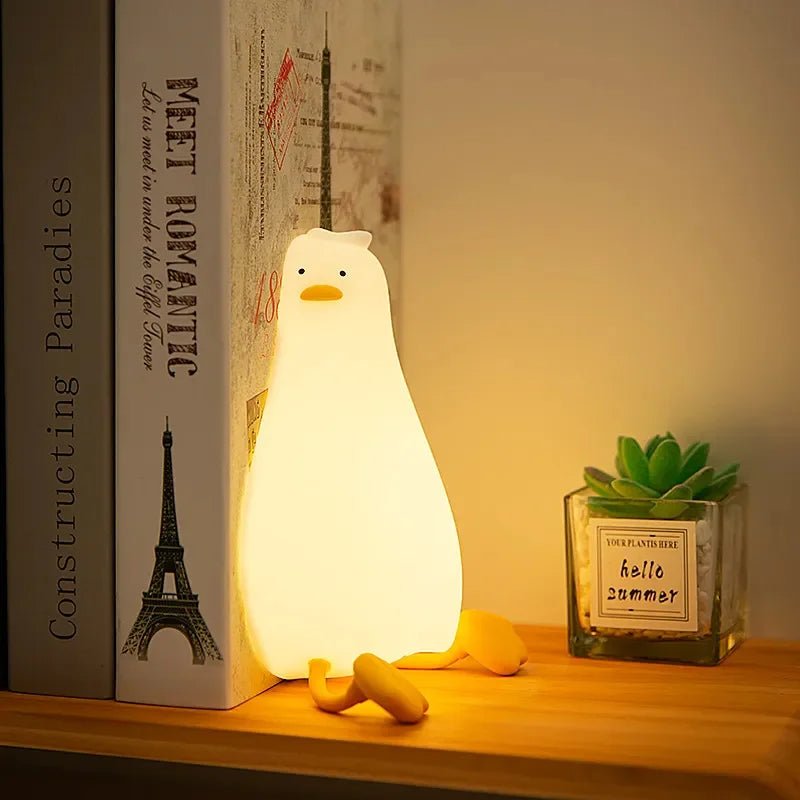 Dimmable silicone animal night light for peaceful kids' sleep, rechargeable, soft glow.