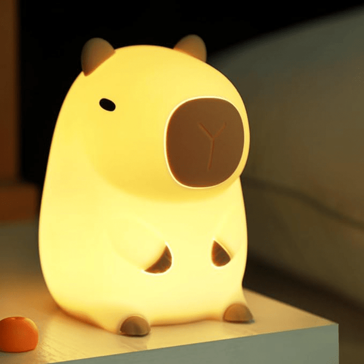 Soft touch silicone night light for kids, gentle glow, rechargeable sleep aid, animal design.