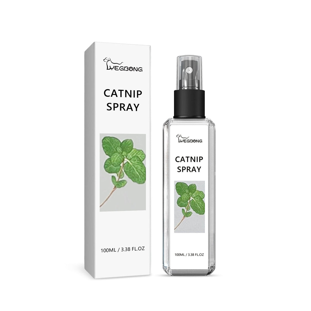 Hand holding Natural Silvervine spray, ready to apply for cat relaxation and fun