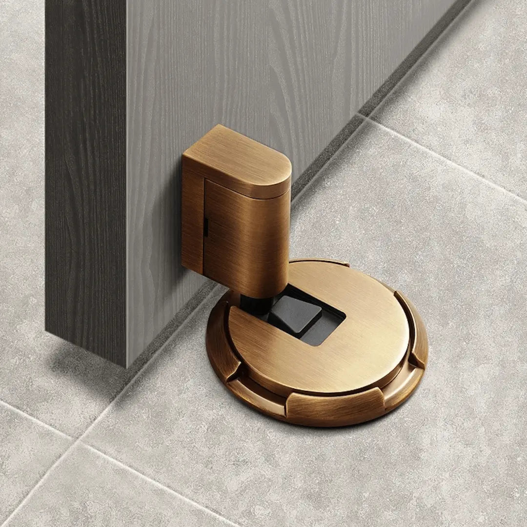 Sleek black magnetic no-drill door stopper, self-adhesive for easy install and secure hold on any door.